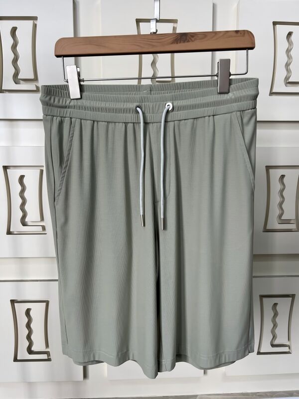 ชาย สินค้าคุณภาพสูง กางเกงสั้นสําหรับวัยรุ่นวัยรุ่น วัสดุแห้งเร็วที่หายใจ ความยาวของเข่า ย้อนหลังฤดูร้อน กระเป๋ากระเป๋า